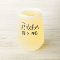 Bitches_Be_Sippin-13oz_Frosted_Wine_Gla_Wine_Filled_Mockup.png_15651202