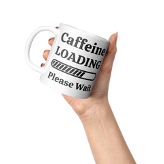Caffeine_Loading-11oz_Ceramic_White_Mug_Lifestyle_Raised_Hand_LH_Mockup.png_15871189