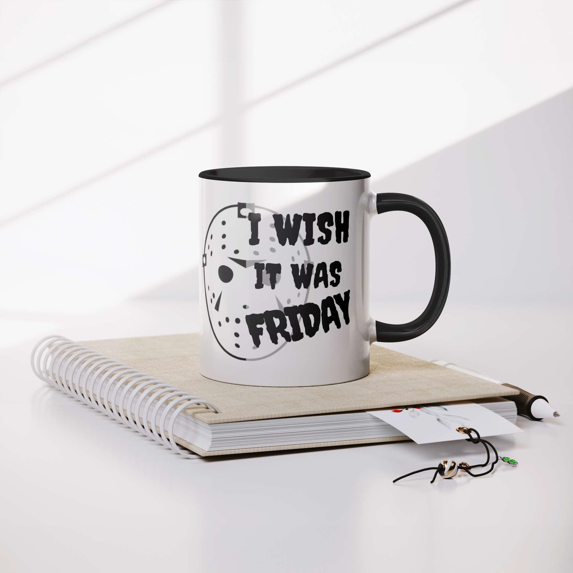 I_Wish_It_Was_Friday-11oz_Ceramic_White__Mug_Lifestyle_Notebook_Mockup.png_15873458