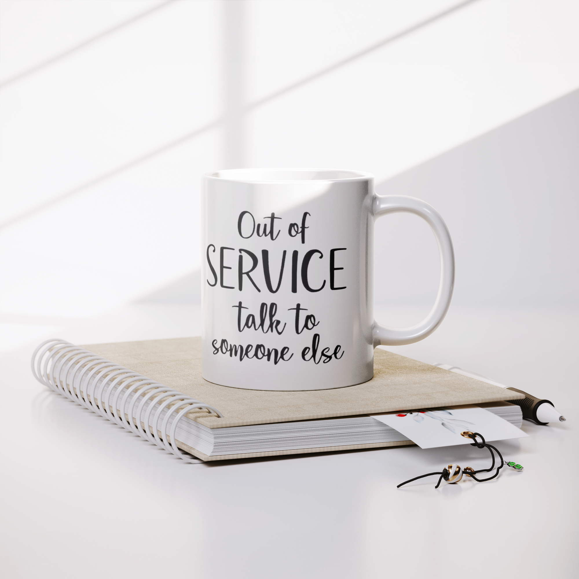 Out_Of_Service_Talk_To_Someone_Else-11oz_Lifestyle_Notebook_Mockup.png_15873448